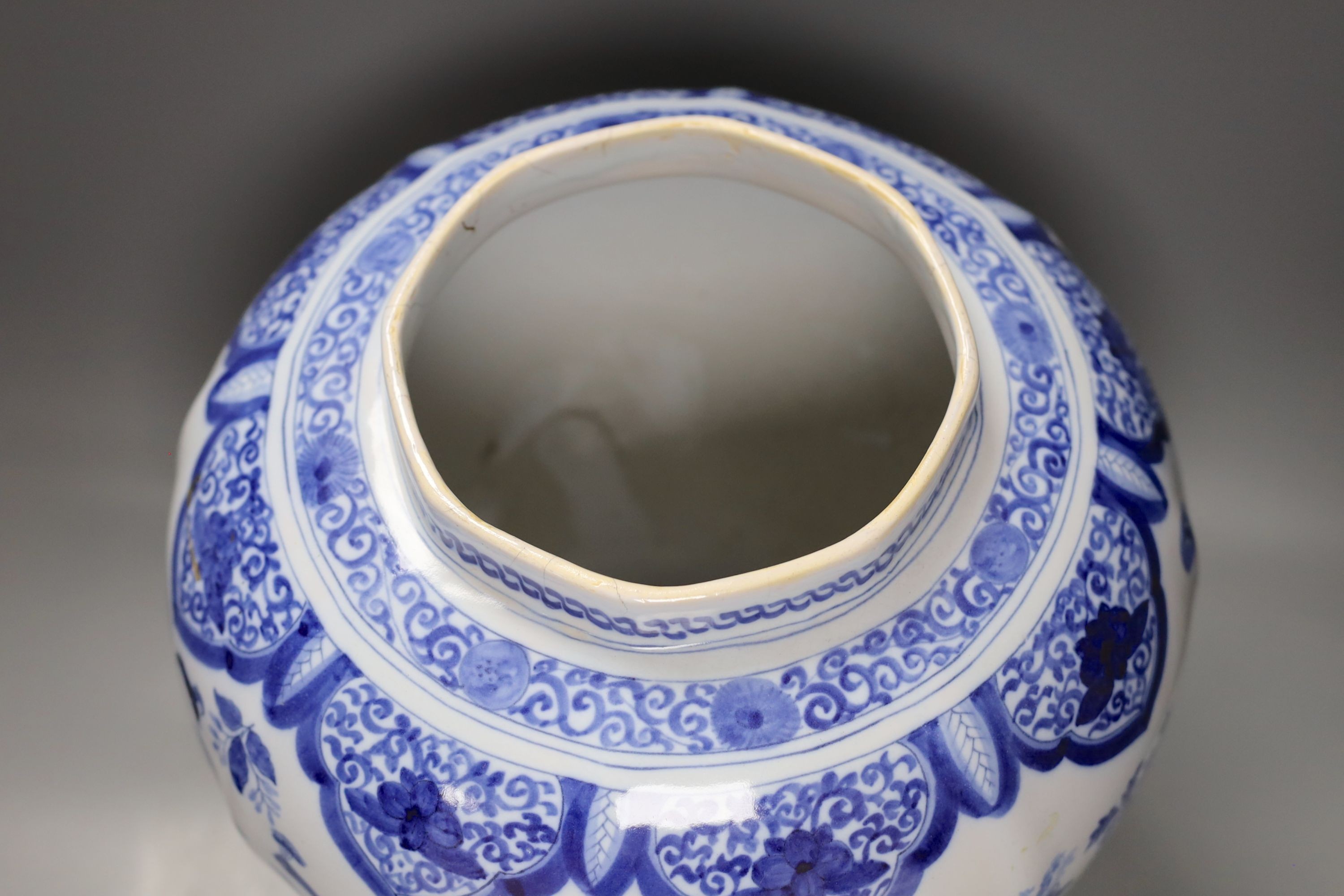 A large blue and white Delft vase, 44 cms high.